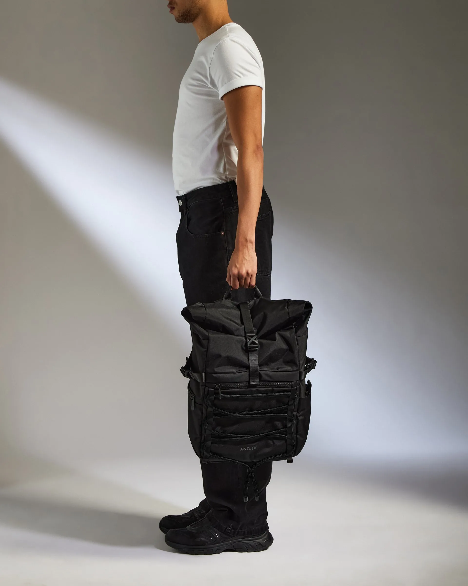 Discovery Roll Top Backpack in Black